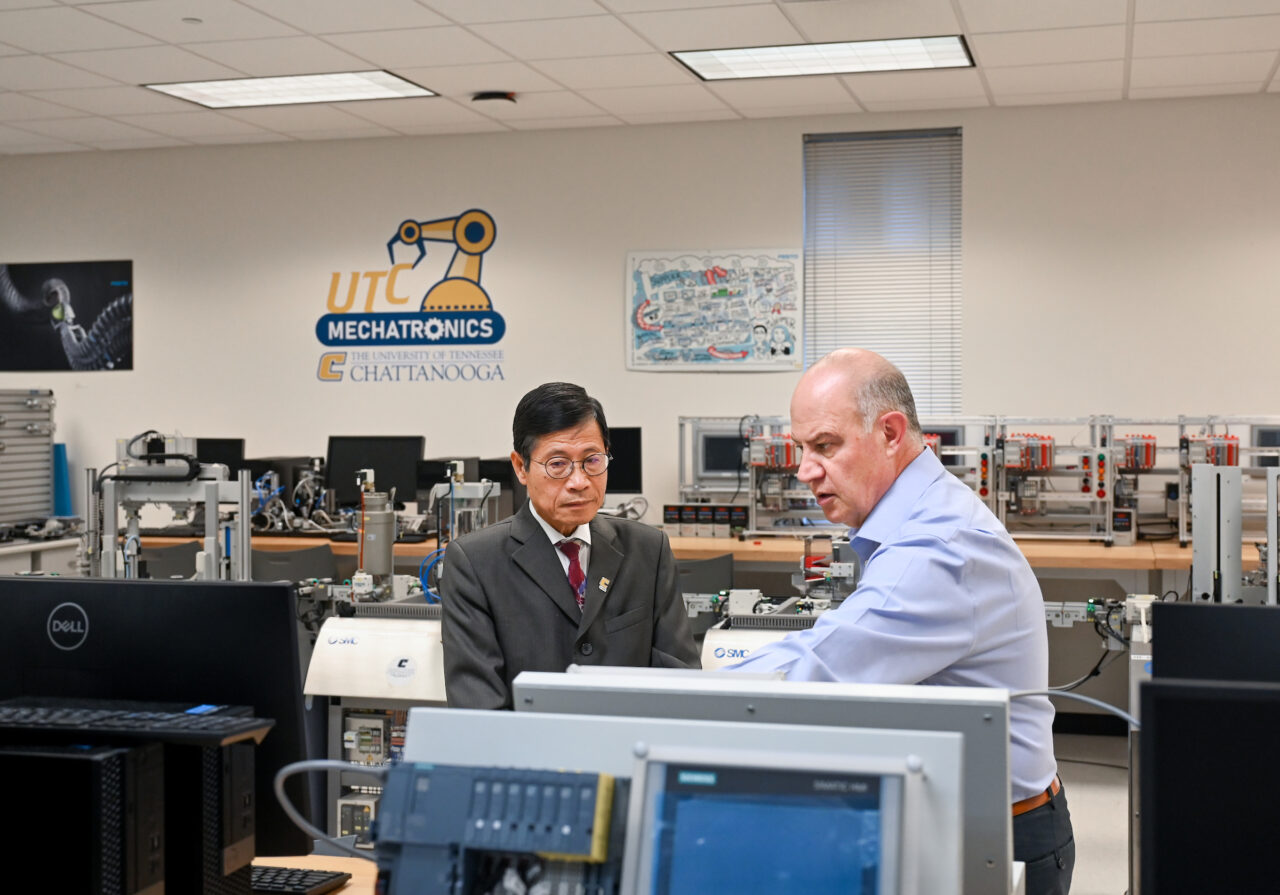 During a visit to UTC in June, Cap Nguyen met with Dr. Ahad Nasab in the UTC Mechatronics Lab. Photo by Jerrod Niles.