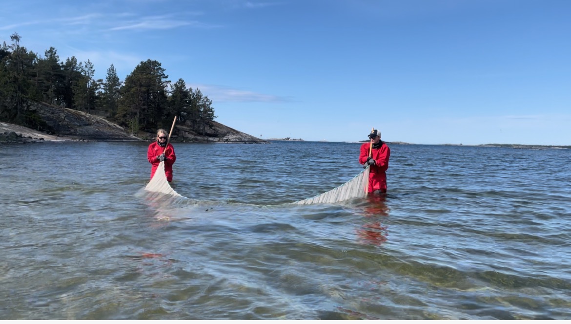 Hope Klug and Carter Jordan catching fish at the Tvärminne Zoological Station, a marine station located at the entrance to the Gulf of Finland (photo courtesy of Hope Klug)