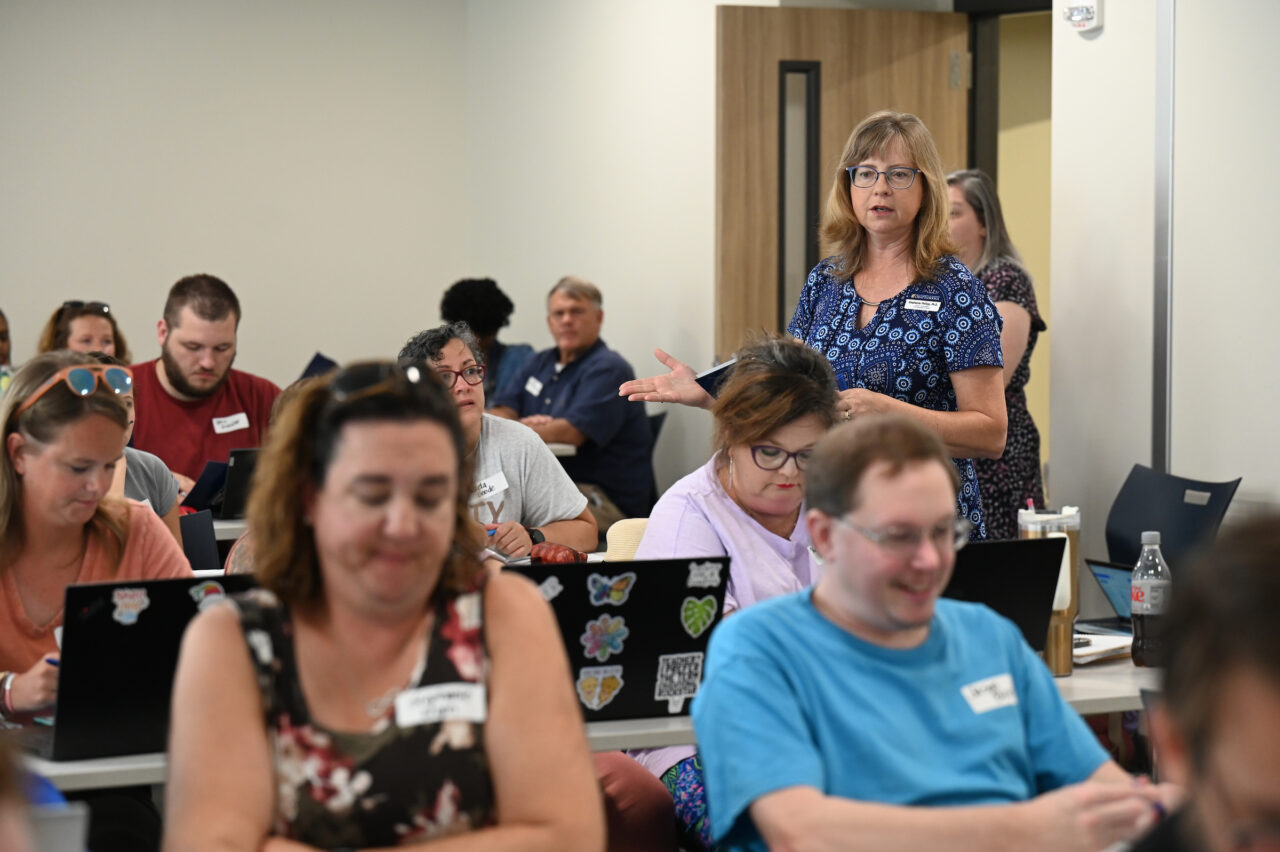 Thanks to a National Science Foundation grant, Dr. Stephanie Philipp, standing, recently hosted 45 Hamilton County Schools K-8 teachers for professional learning activities to help teachers integrate computational thinking into their existing curriculum. Photo by Angela Foster.