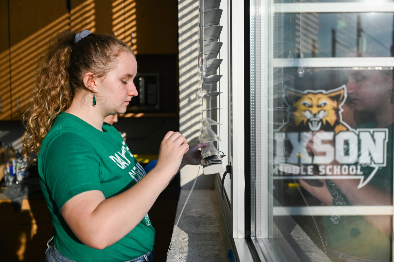 Students work Friday, Sept. 22, 2023 at Hixson Middle School and the Chattanooga Zoo as part of Day of Caring.