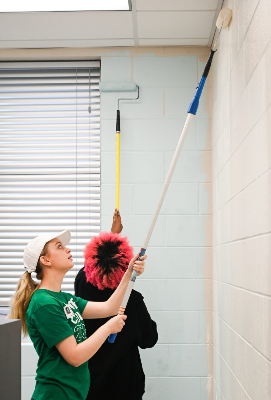 Students work Friday, Sept. 22, 2023 at Hixson Middle School and the Chattanooga Zoo as part of Day of Caring.