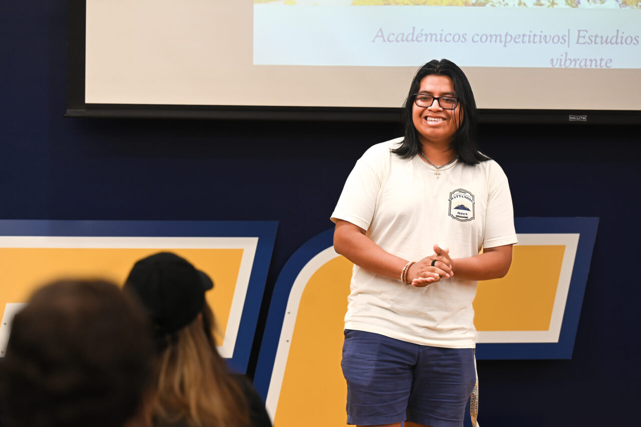 UTC sophomore Andy Tomas welcomes a tour group on Friday, Aug. 25, at the University's first Spanish-speaking tour. Photo by Angela Foster.