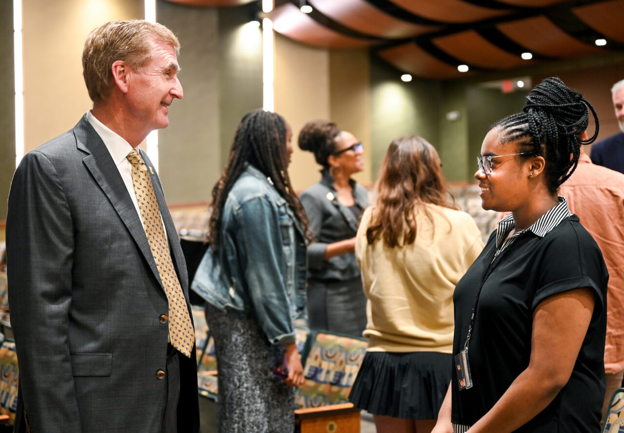 University of Tennessee at Chattanooga Chancellor Steven Angle talks with student Autumn Griggs after delivering the State of the University address on Friday, Sept. 15.