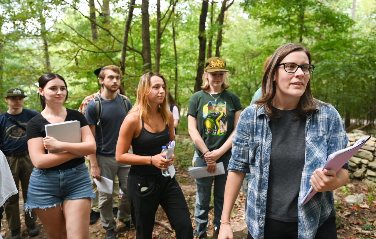 Students in Monica Miles’ Ecology Laboratory 3070 class, including junior Brooklynn Ashmore (far left), learned how to locate and tag invasive species Sept. 20, 2023, at Reflection Riding.