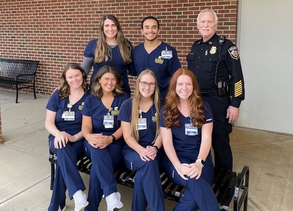 Front row: Maggie Howell, Lily Kolwyck, Hollie Petty, Mallory Collier. Back row: Paige Hopkins, Daniel Morataya, UTC Police Chief Robert Ratchford.