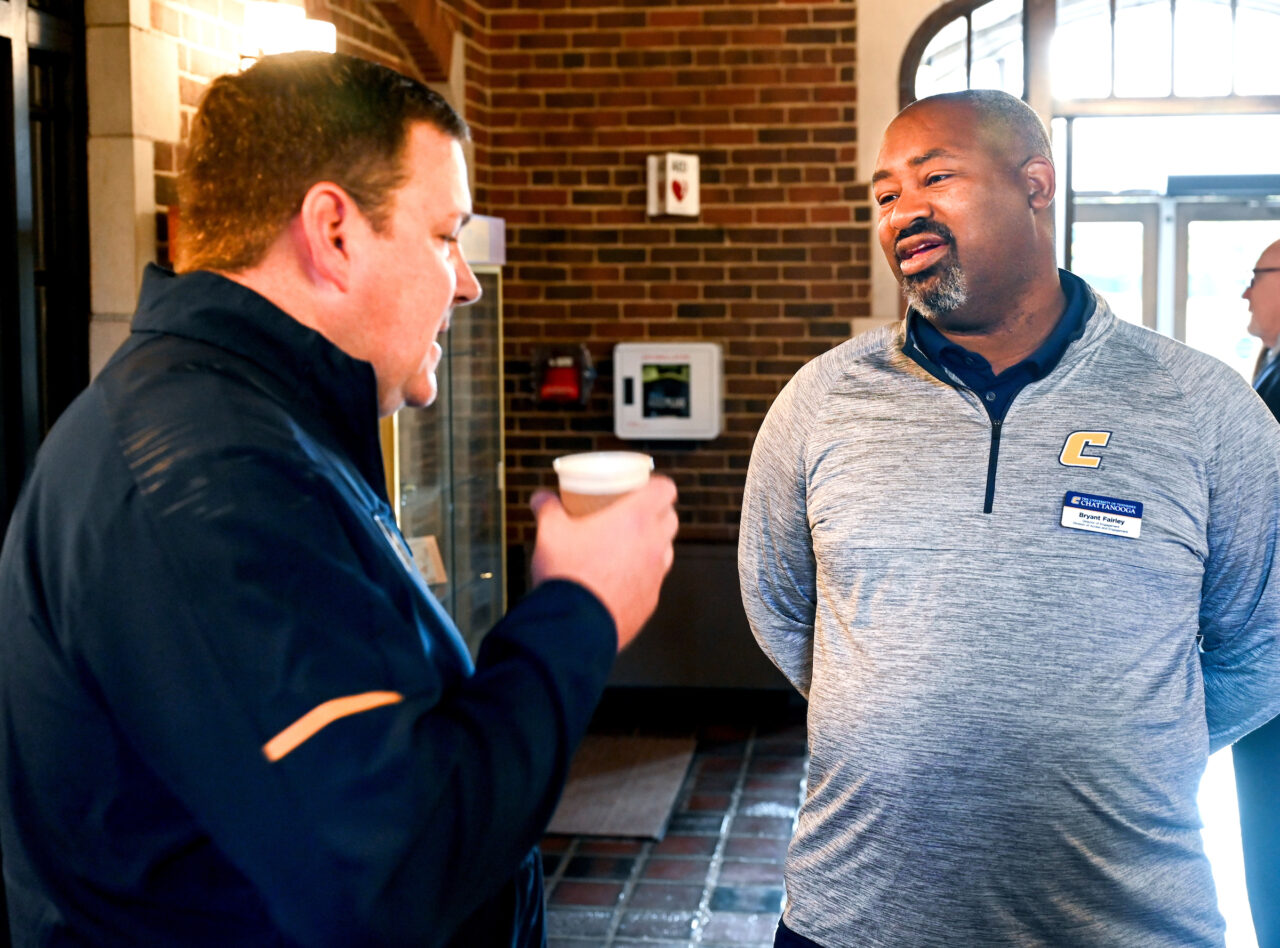 Bryant Fairley, director of engagement for the UTC Division of Access and Engagement, talks with Vice Chancellor for Finance and Administration Brent Goldberg at a new staff meet-and-greet Oct. 24, 2023. Photo by Angela Foster.