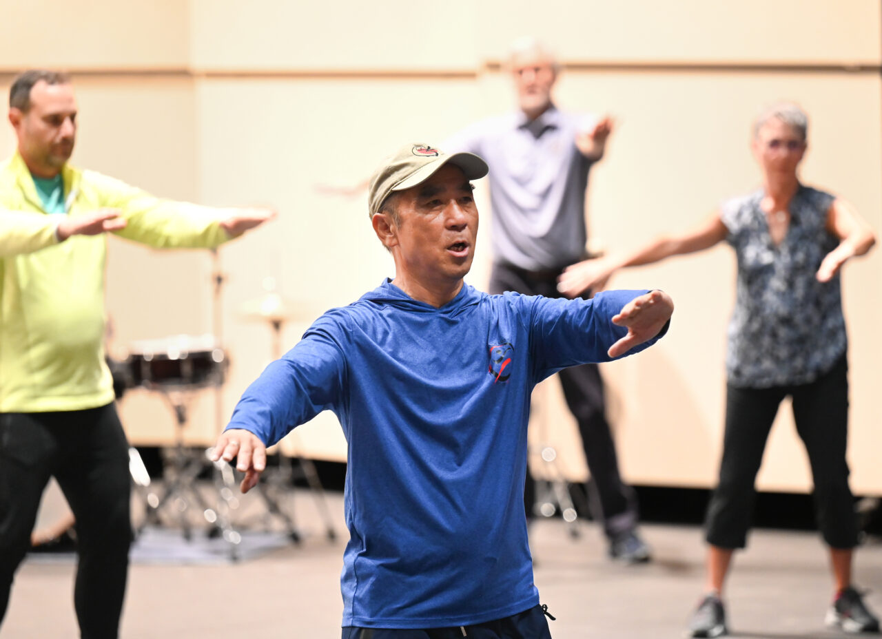 Dr. Zibin Guo began the Wheelchair/Adaptive Tai Chi program in 2016 to train health care workers to teach the smooth, fluid movements of the martial art to veterans with disabilities.