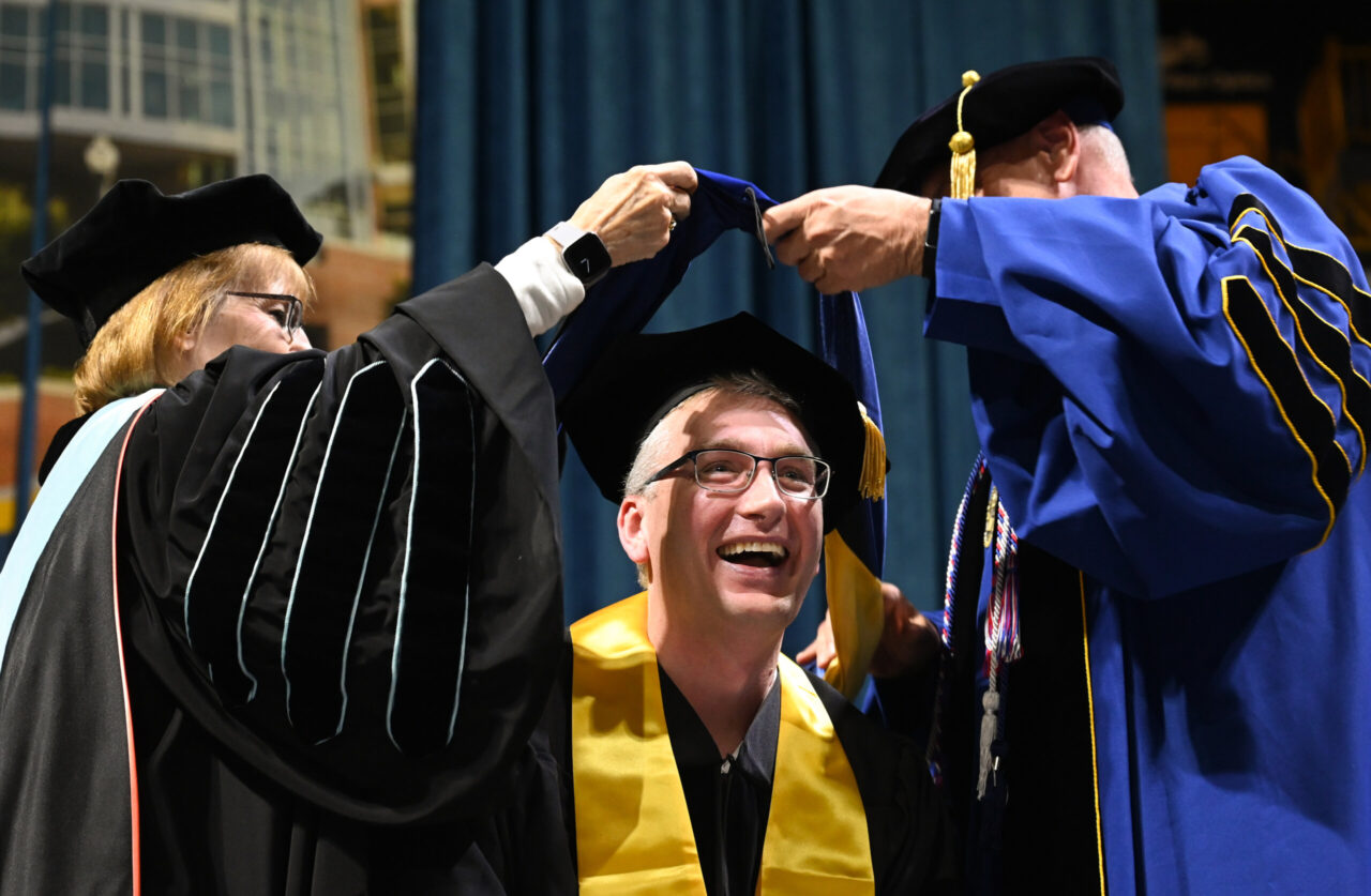 Students participate in the Graduate School commencement Friday, Dec. 15, 2023 in McKenzie Arena.