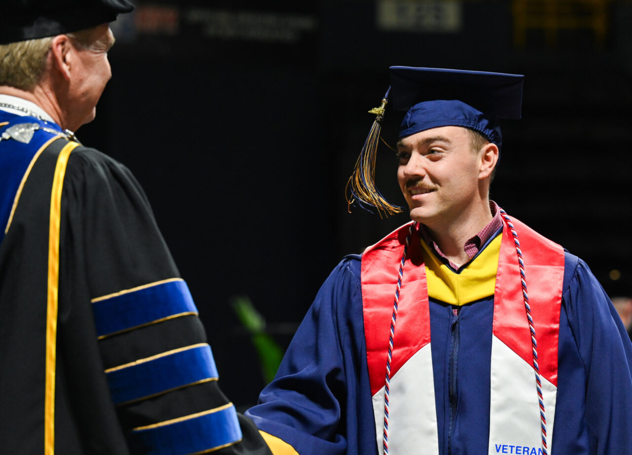 Students participate in the Graduate School commencement Friday, Dec. 15, 2023 in McKenzie Arena.