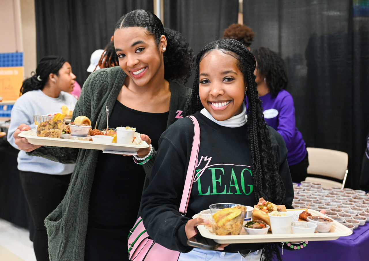 Alpha Kappa Alpha Sorority members Mya McKinney, left, and Mirrakle Bre 'Aisha Randolph at the 2023 Taste of Black Chattanooga event. Photo by Angela Foster.