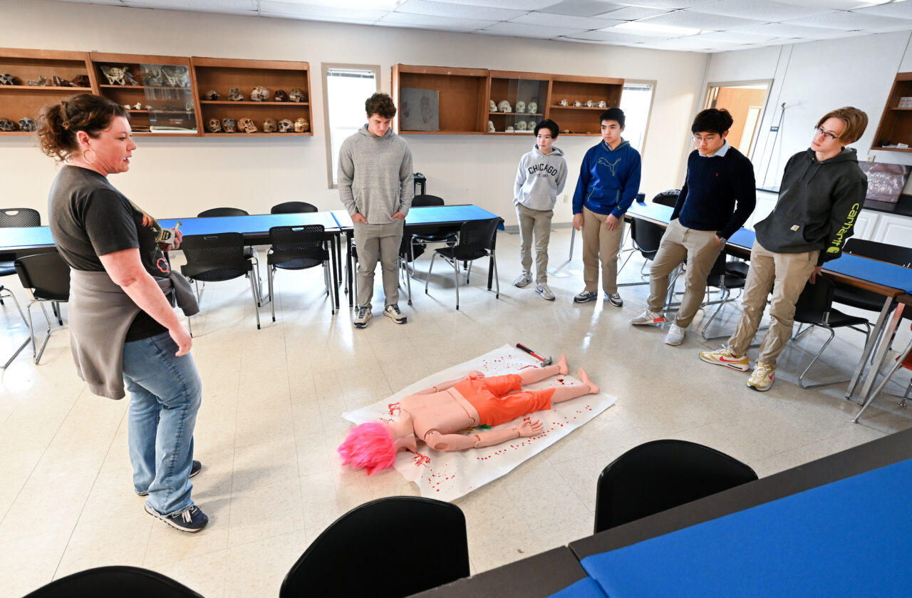 Senior Lecturer Sara Knox demonstrated techniques used in blood spatter analysis.