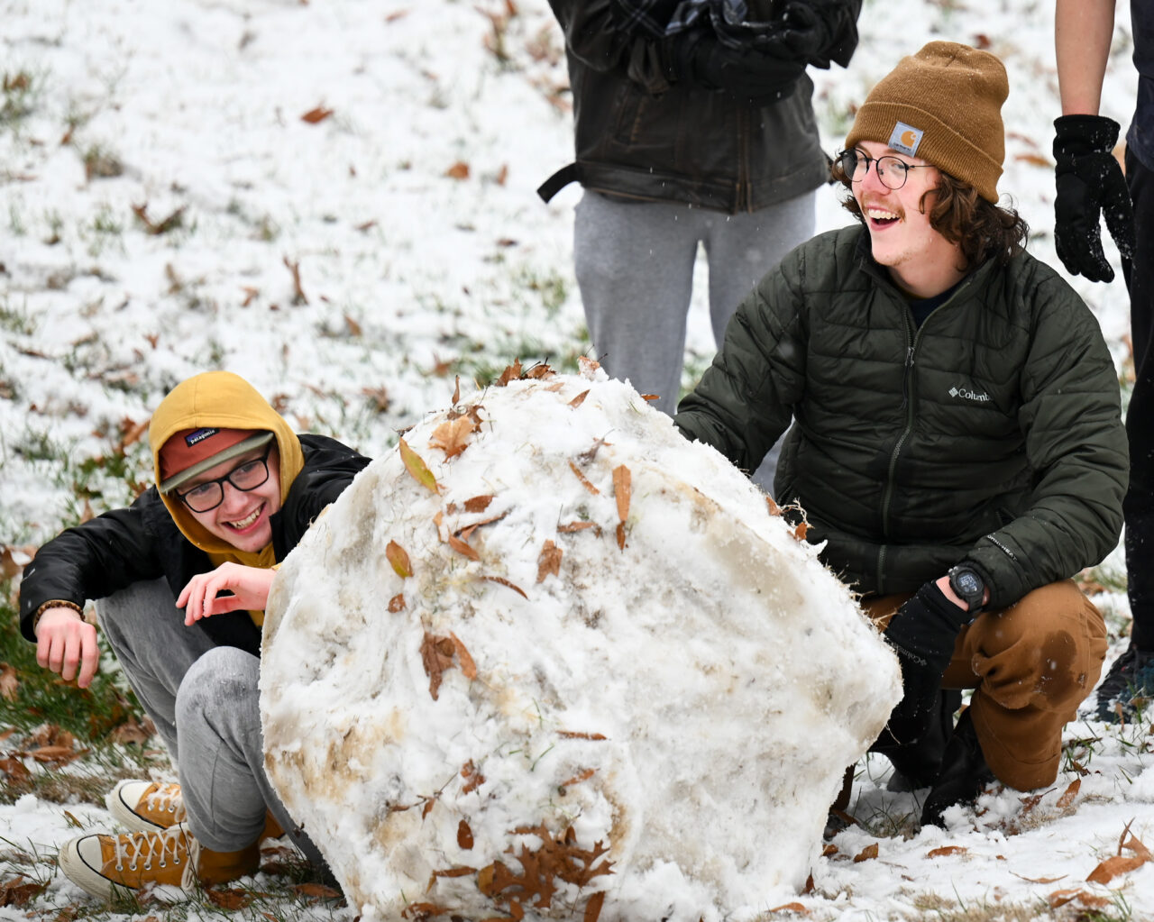 Students play in the snow Monday, Jan. 15, 2024 on Chamberlain Field.