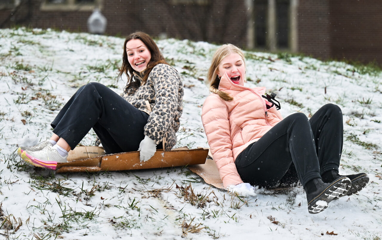 Students play in the snow Monday, Jan. 15, 2024 on Chamberlain Field.