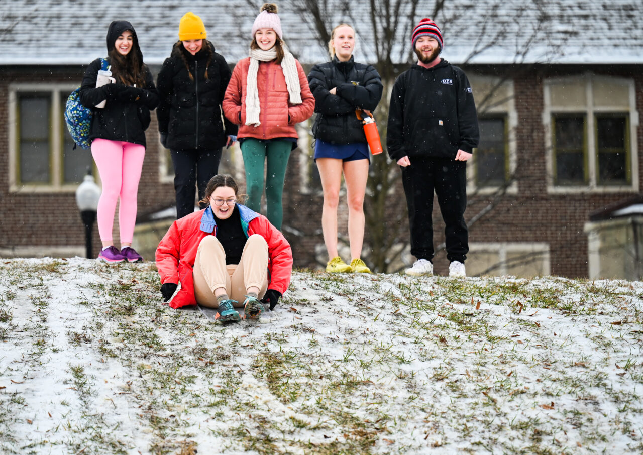 Students play in the snow Monday, Jan. 15, 2024 on Chamberlain Field.