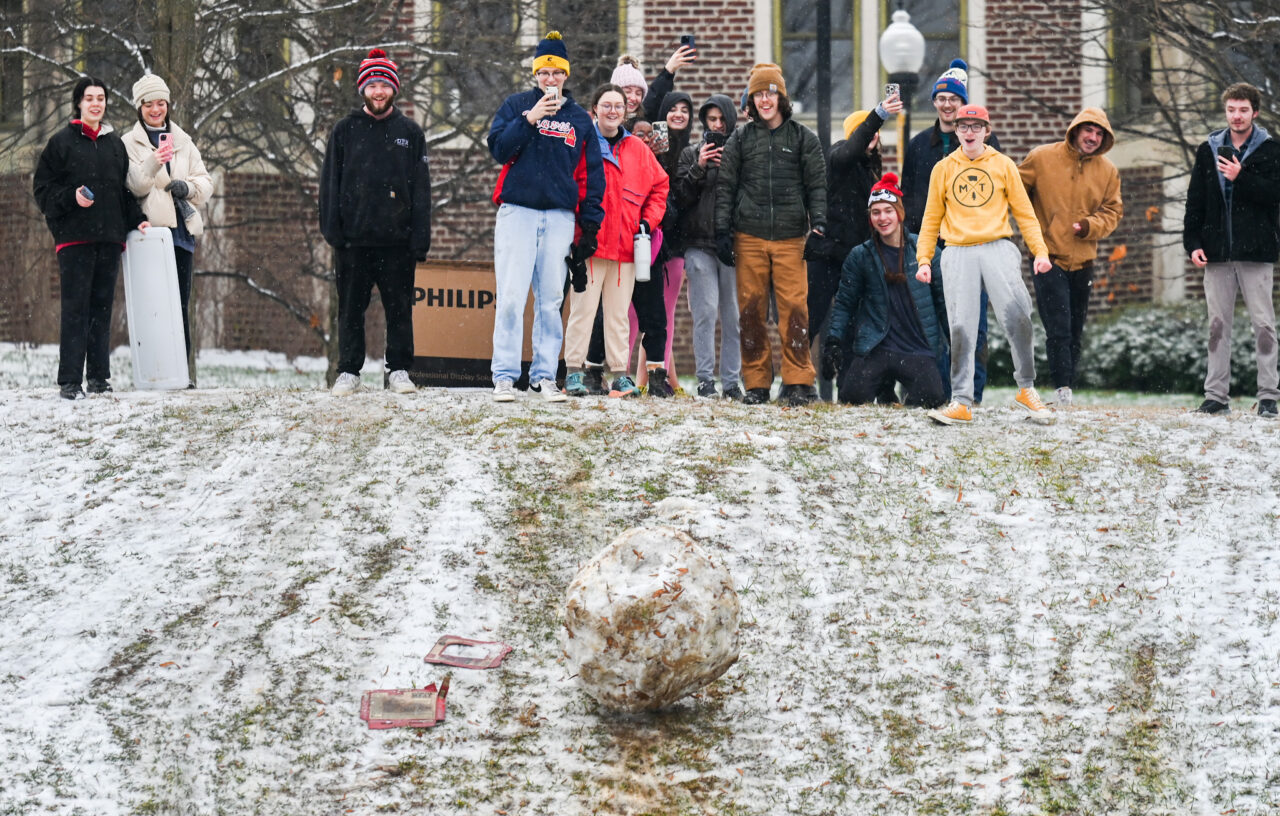 Students play in the snow Monday, Jan. 15, 2024 on Chamberlain Field.