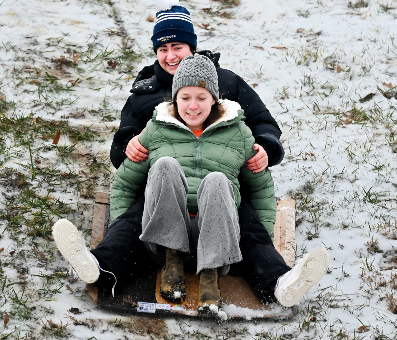 Students play in the snow Monday, Jan. 15, 2024 on Chamberlain Field.