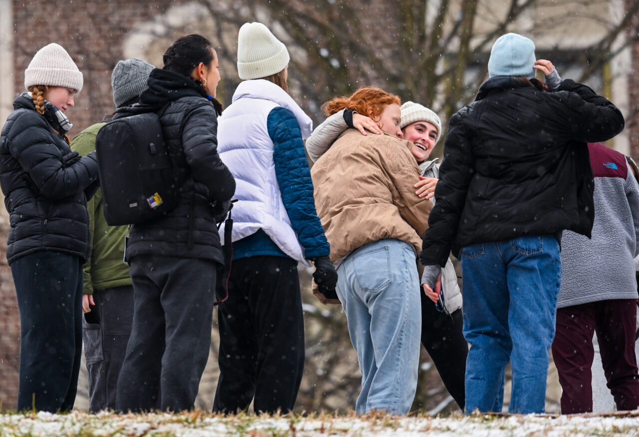 Students play in the snow Monday, Jan. 15, 2024 on Chamberlain Field.