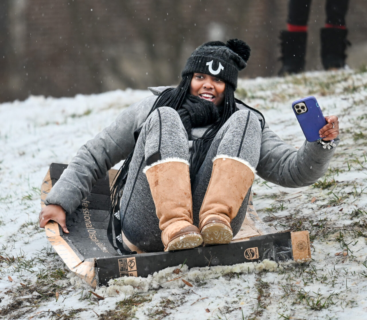 Students play in the snow Monday, Jan. 15, 2024 on Chamberlain Field.