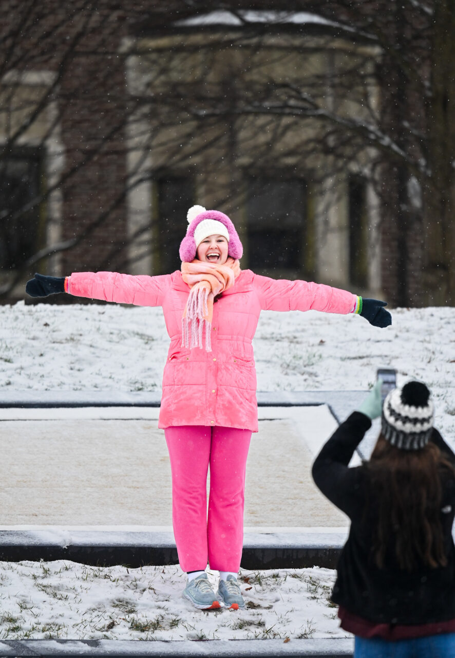 Students play in the snow Monday, Jan. 15, 2024 on Chamberlain Field.