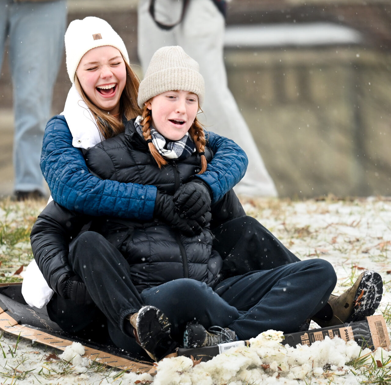 Students play in the snow Monday, Jan. 15, 2024 on Chamberlain Field.
