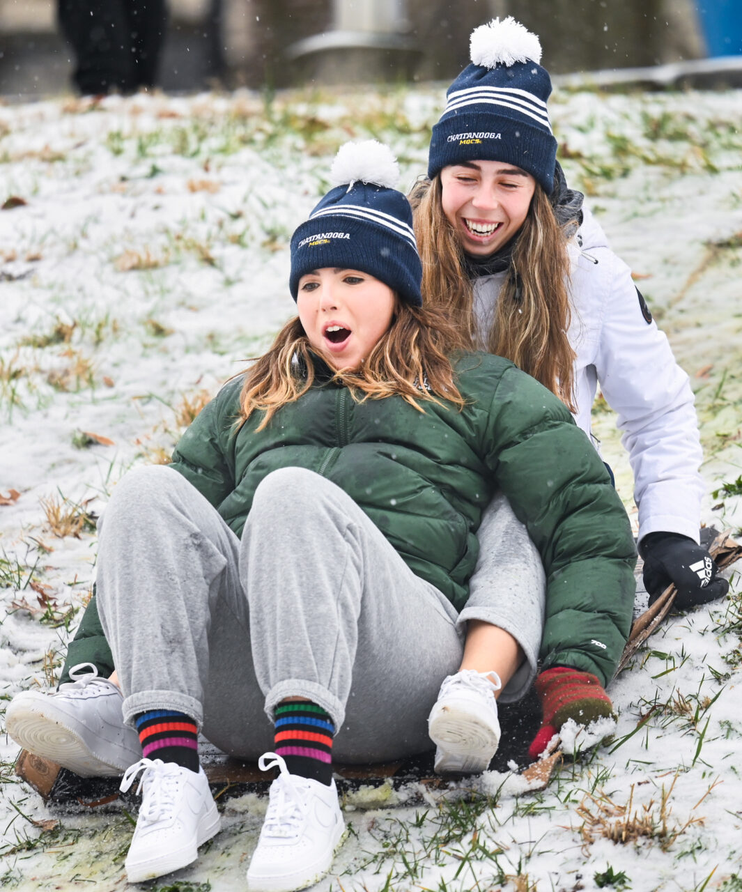 Students play in the snow Monday, Jan. 15, 2024 on Chamberlain Field.