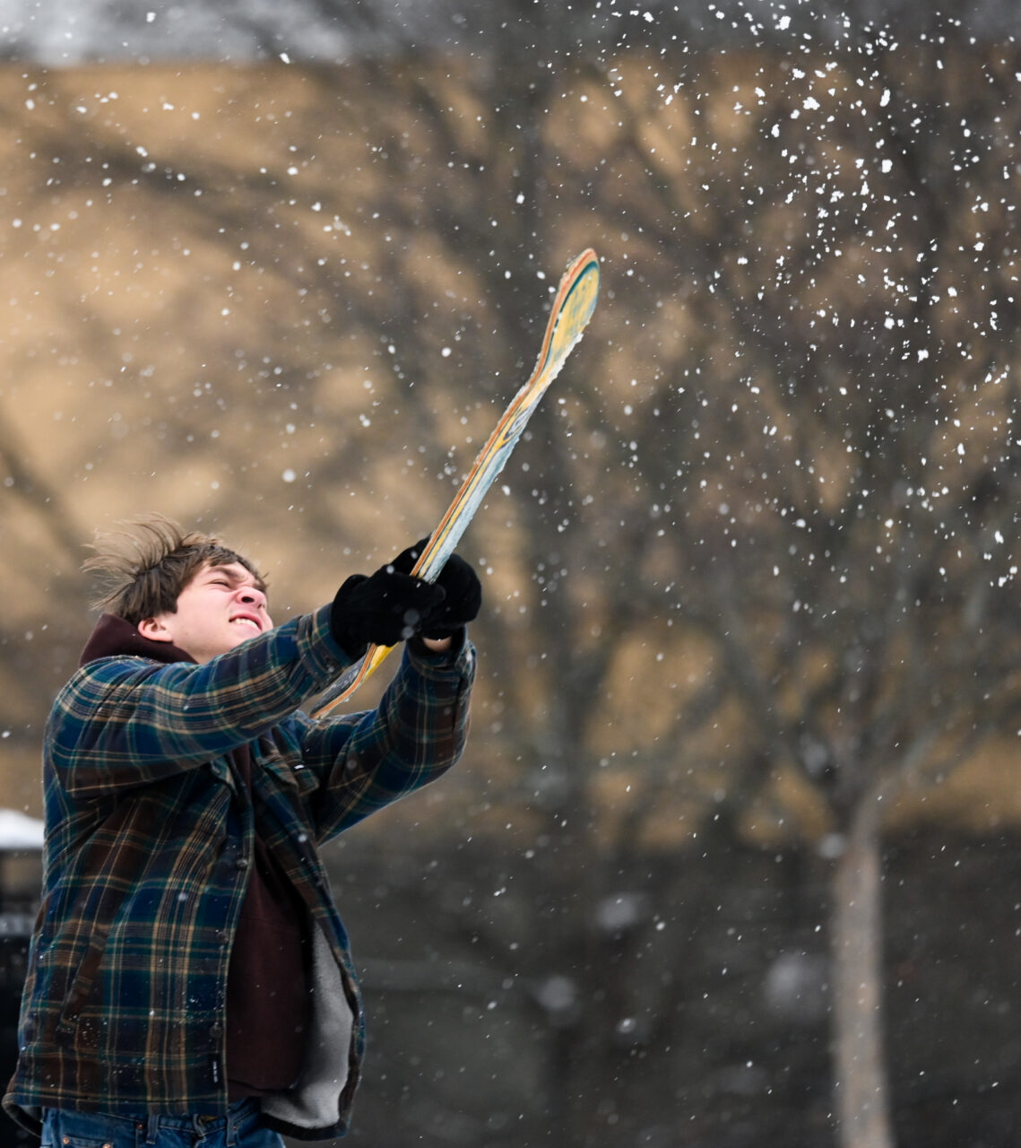 Students play in the snow Monday, Jan. 15, 2024 on Chamberlain Field.