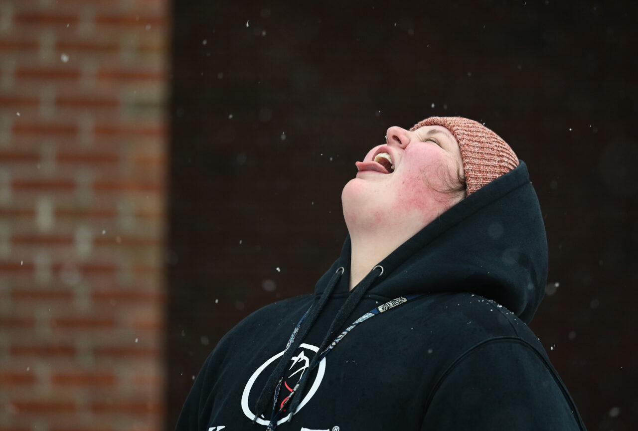 Students play in the snow Monday, Jan. 15, 2024 on Chamberlain Field.