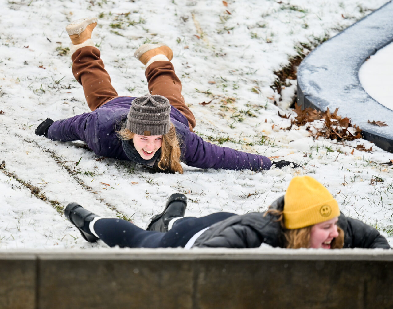 Students play in the snow Monday, Jan. 15, 2024 on Chamberlain Field.