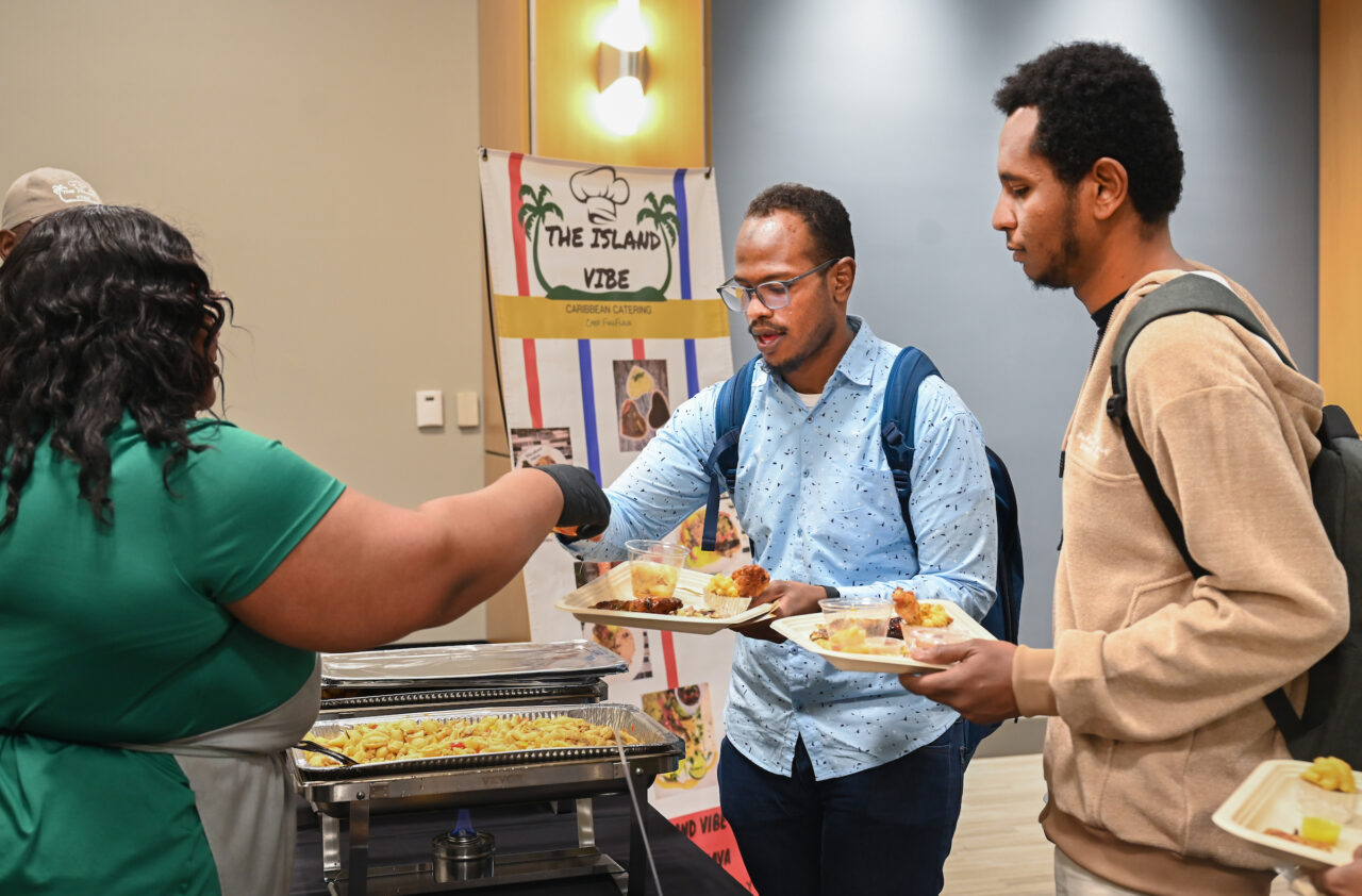 UTC students were served up cajun cuisine from The Island Vibe at Taste of Black Chattanooga. Photo by Angela Foster.