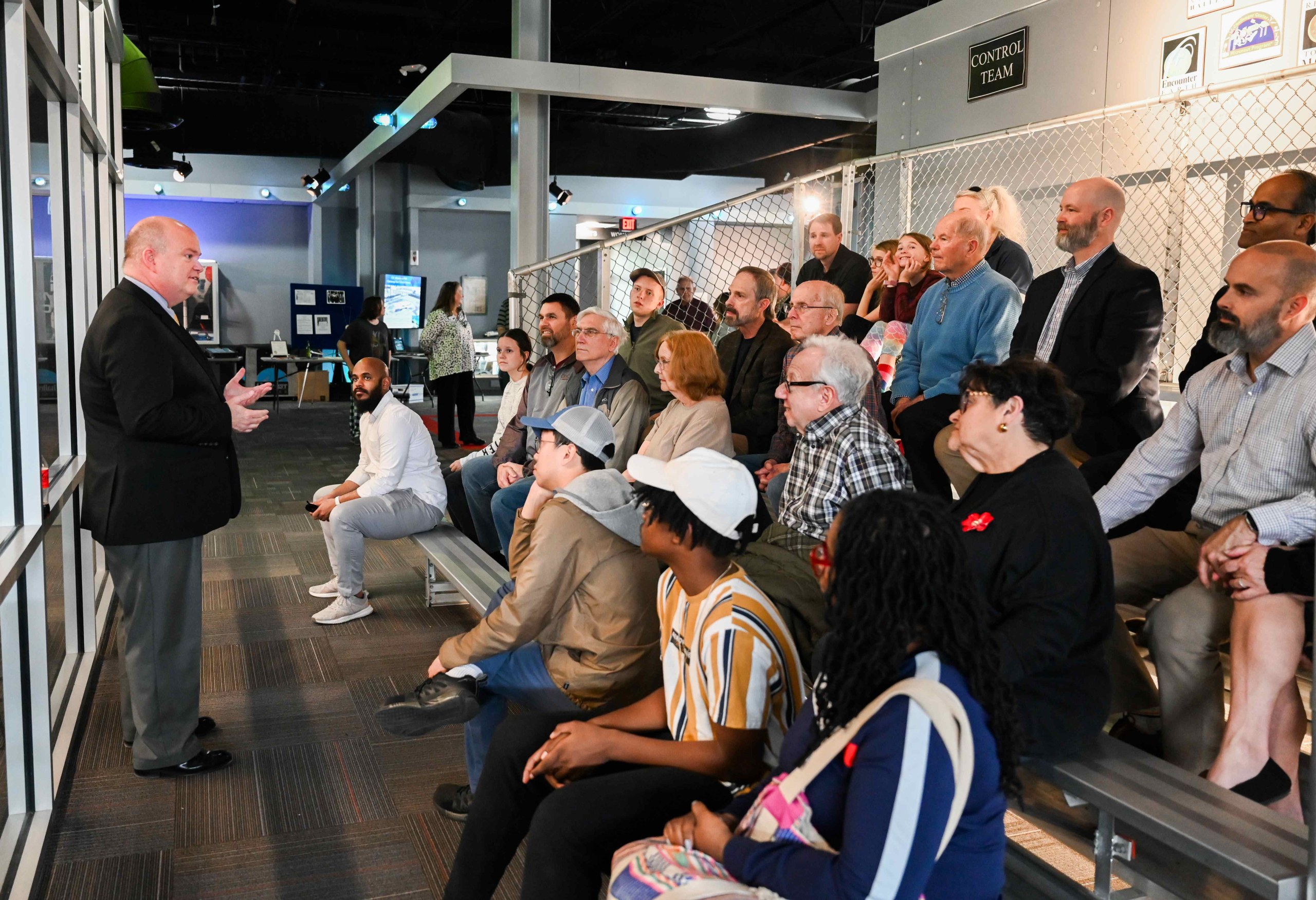 Mike Holman, left, leads a discussion at the UTC Challenger Center during the Chattanooga Engineer's Club's 100th anniversary event on March 25. Photo by Angela Foster.