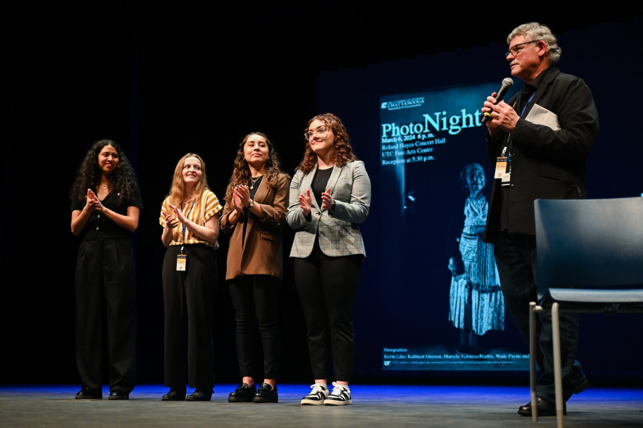 Students, staff, faculty and community members attend Photo Night Wednesday, Mar. 6, 2024 in the Roland Hayes Concert Hall.
