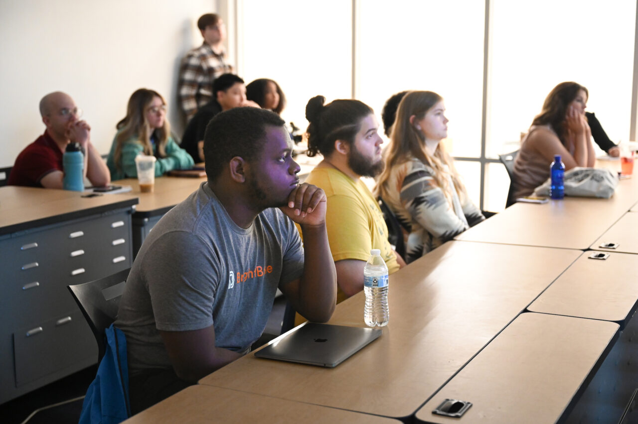 Students, staff, faculty and community members attend Photo Night Wednesday, Mar. 6, 2024 in the Roland Hayes Concert Hall.