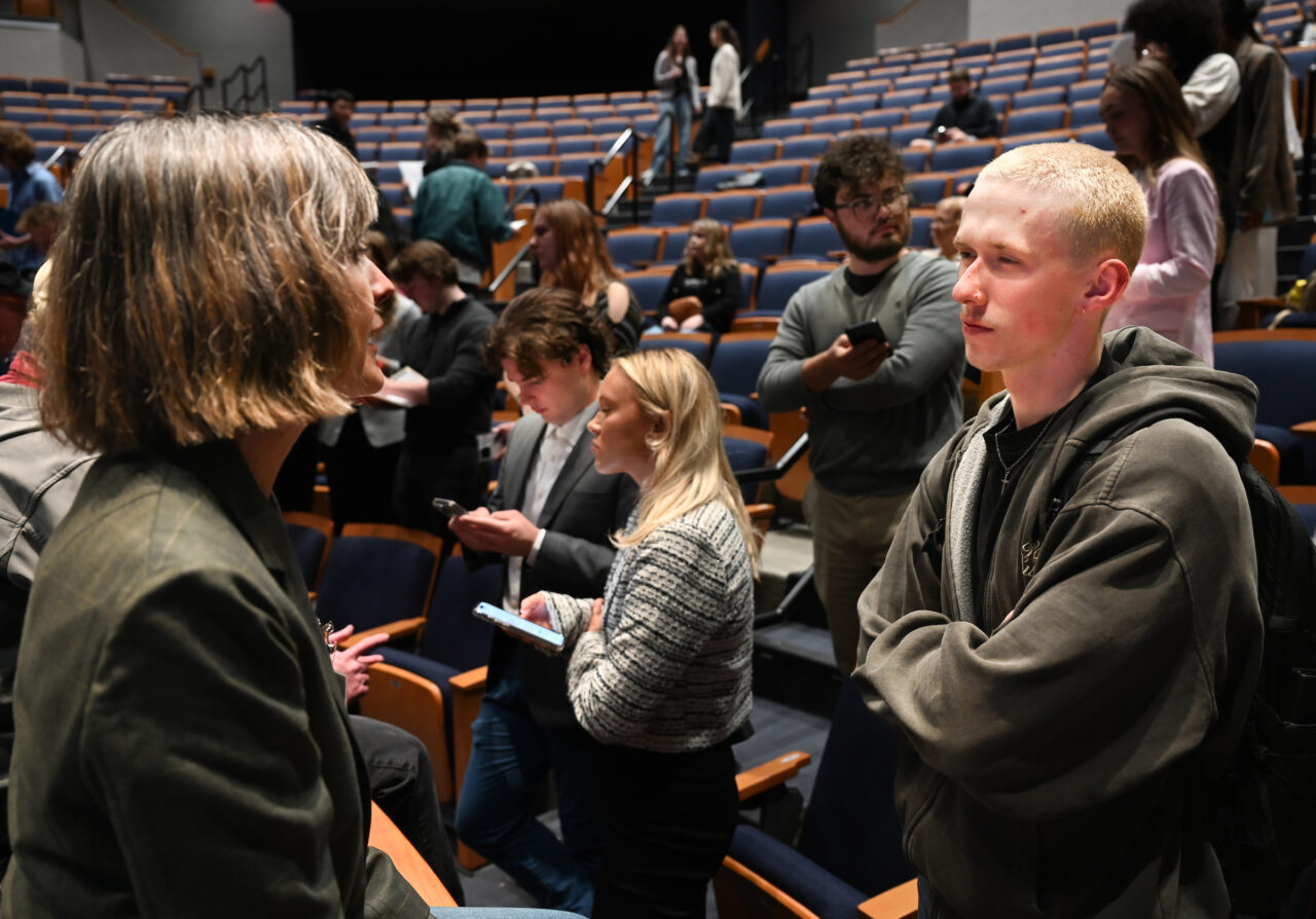 Students, staff, faculty and community members attend Photo Night Wednesday, Mar. 6, 2024 in the Roland Hayes Concert Hall.