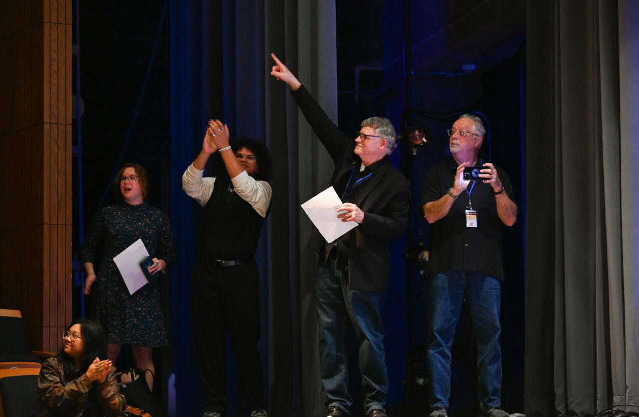 Students, staff, faculty and community members attend Photo Night Wednesday, Mar. 6, 2024 in the Roland Hayes Concert Hall.