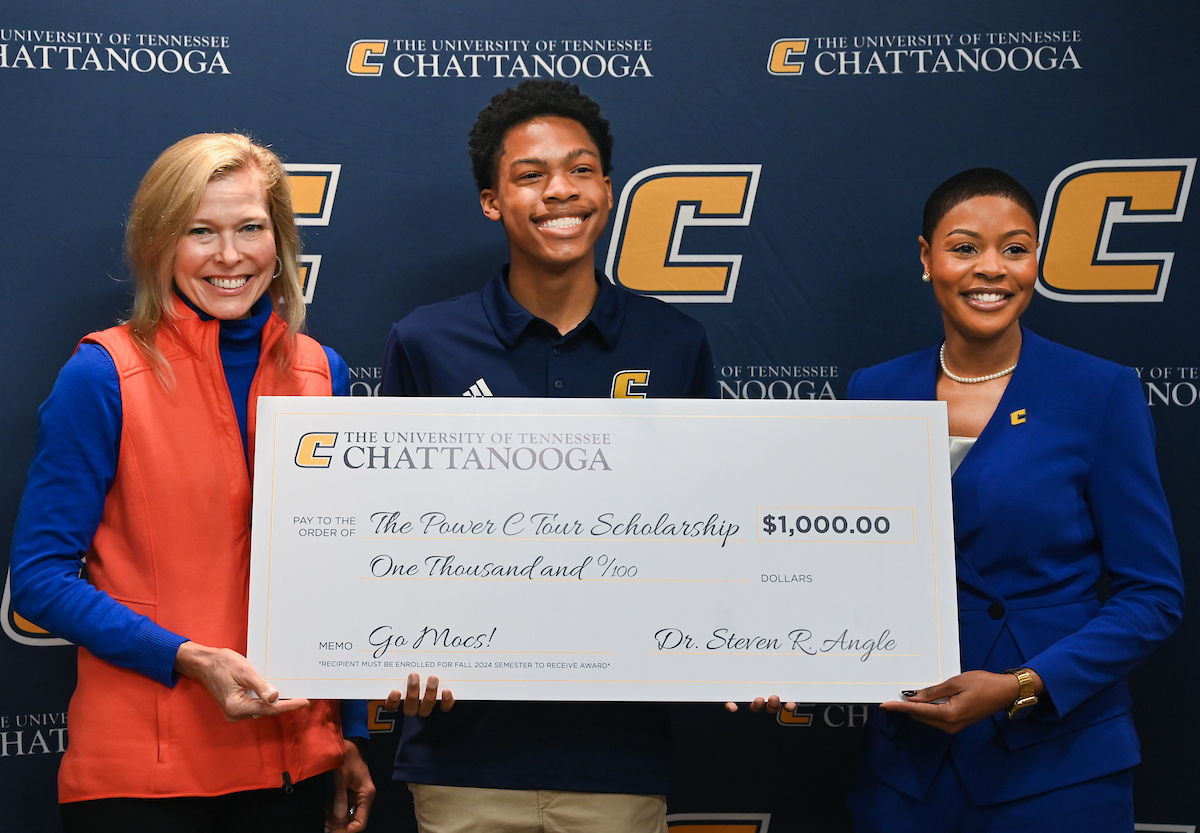 ChattState student Joshua Clay was one of two awarded the $1,000 Power C Tour Scholarship presented by Dr. Rebecca Ashford, left, and Dr. Artanya Wesley. Photo by Angela Foster.