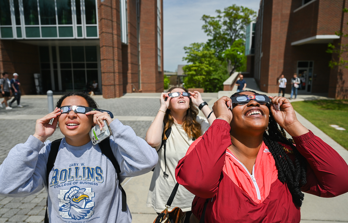 Students watch the eclipse Monday, April 8, 2024 on Chamberlain Field.