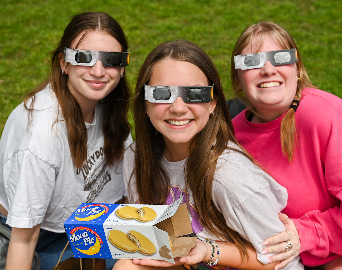 Students watch the eclipse Monday, April 8, 2024 on Chamberlain Field.