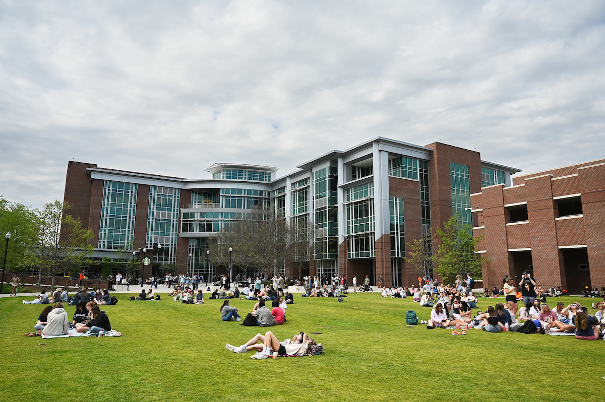 Students watch the eclipse Monday, April 8, 2024 on Chamberlain Field.