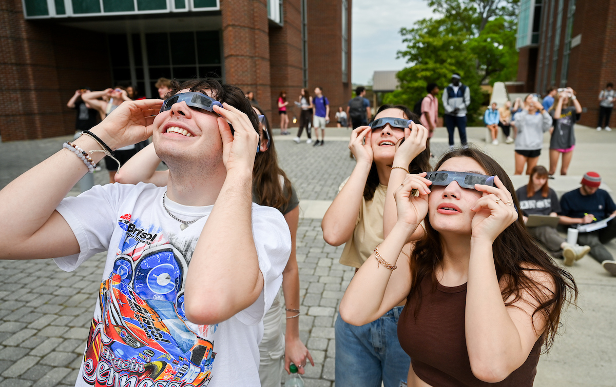 Students watch the eclipse Monday, April 8, 2024 on Chamberlain Field.