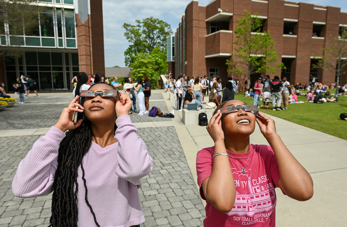 Students watch the eclipse Monday, April 8, 2024 on Chamberlain Field.