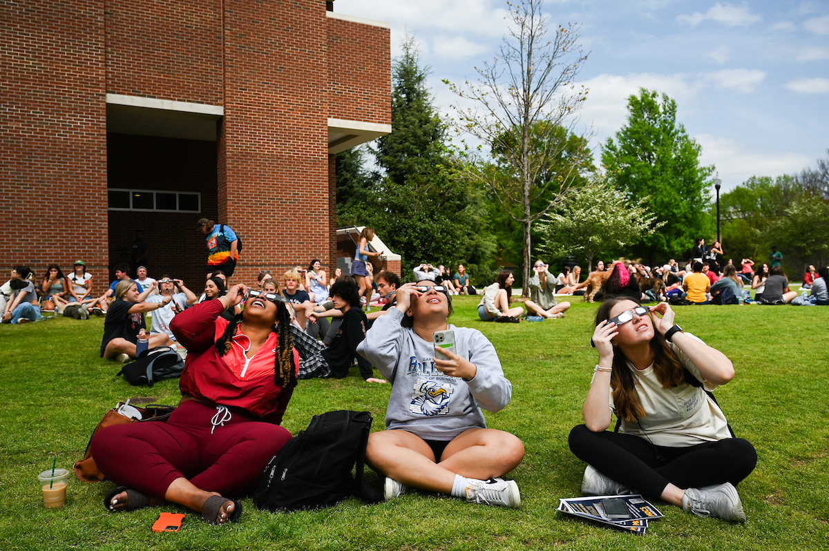 Students watch the eclipse Monday, April 8, 2024 on Chamberlain Field.