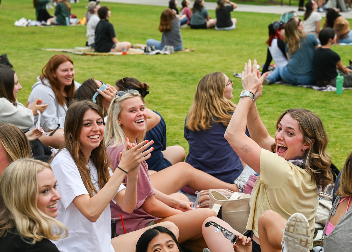 Students watch the eclipse Monday, April 8, 2024 on Chamberlain Field.