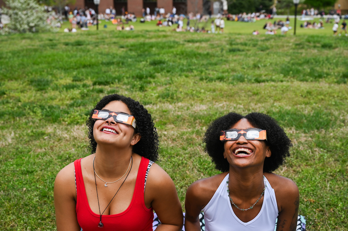 Students watch the eclipse Monday, April 8, 2024 on Chamberlain Field.