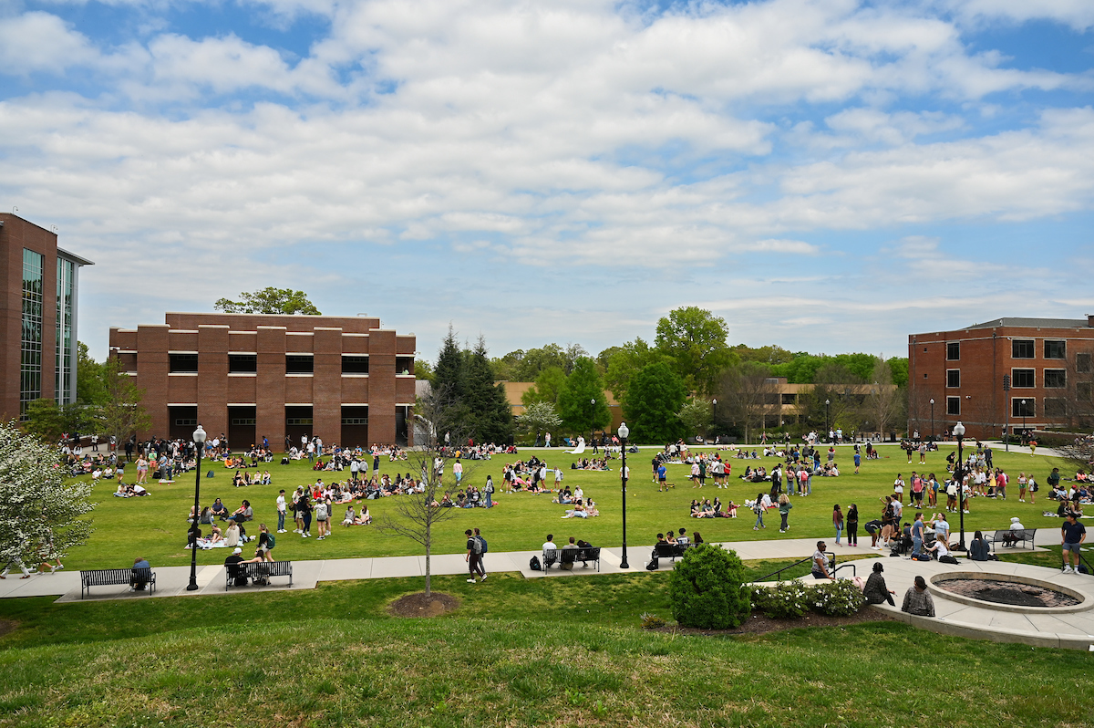 Students watch the eclipse Monday, April 8, 2024 on Chamberlain Field.