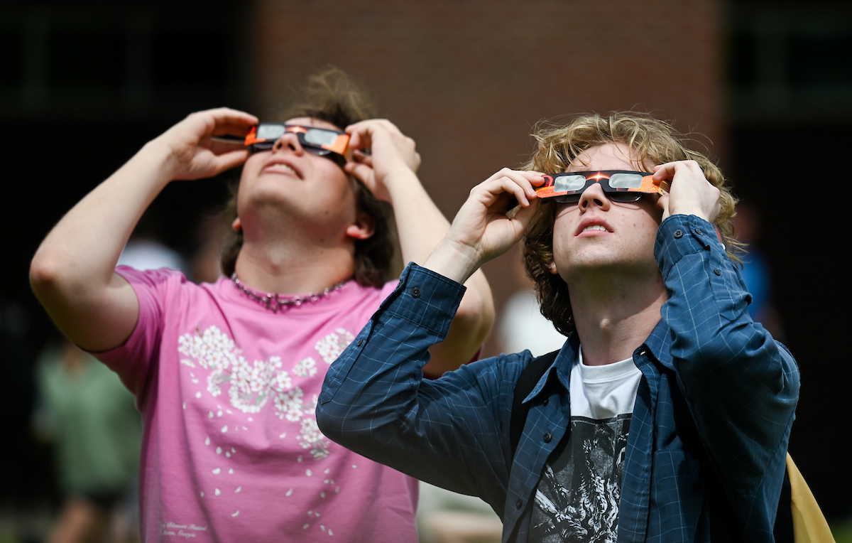 Students watch the eclipse Monday, April 8, 2024 on Chamberlain Field.