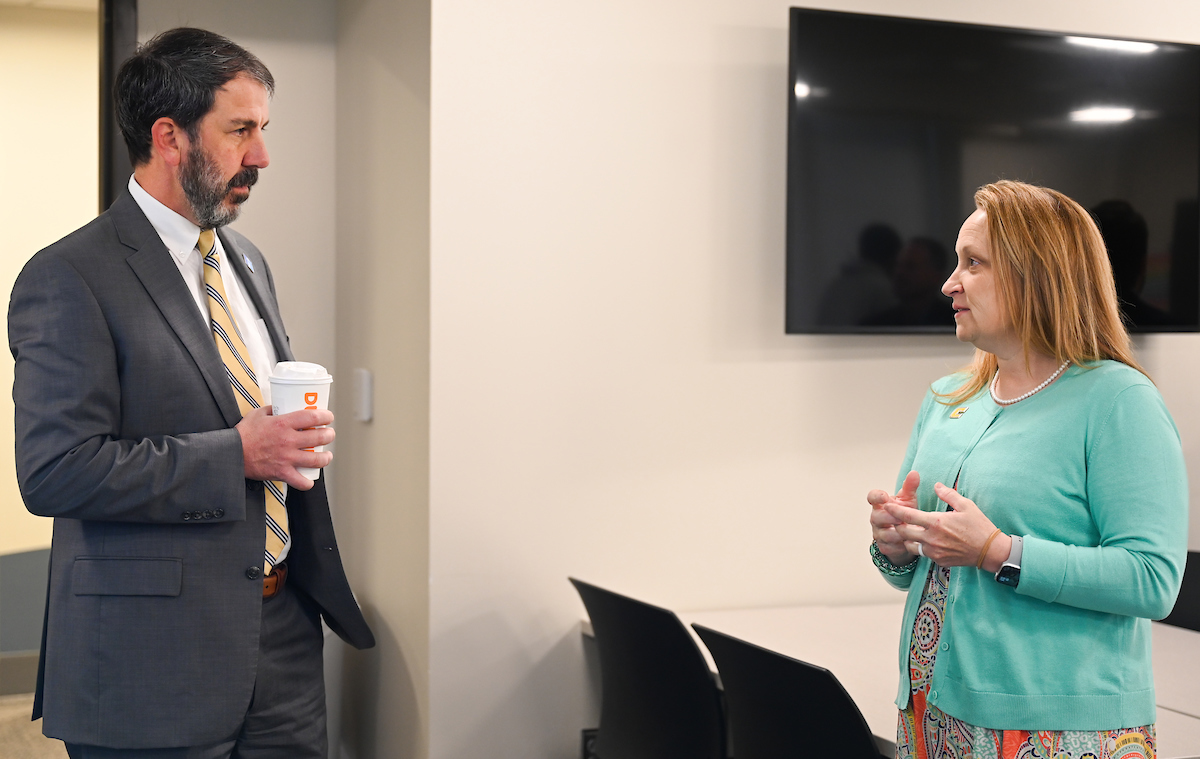 Hamilton County Schools Superintendent Justin Robertson, left, and UTC Chancellor Steven Angle sign an MOU Wednesday, April 3, 2024 in Hunter Hall on the University of Tennessee at Chattanooga campus.