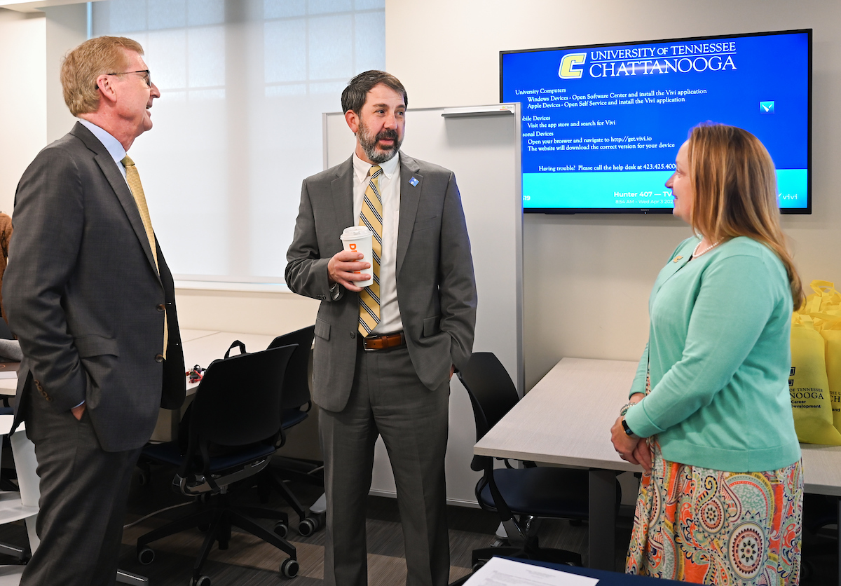 Hamilton County Schools Superintendent Justin Robertson, left, and UTC Chancellor Steven Angle sign an MOU Wednesday, April 3, 2024 in Hunter Hall on the University of Tennessee at Chattanooga campus.