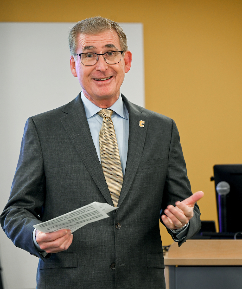 Hamilton County Schools Superintendent Justin Robertson, left, and UTC Chancellor Steven Angle sign an MOU Wednesday, April 3, 2024 in Hunter Hall on the University of Tennessee at Chattanooga campus.