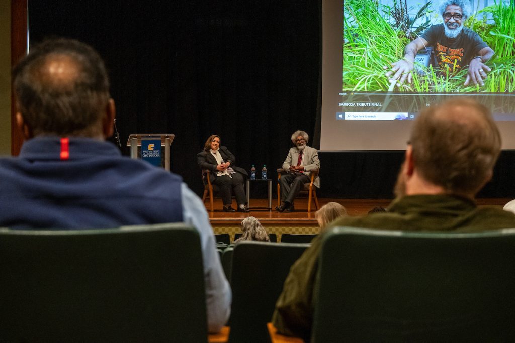 Dr. Jose Barbosa answers audience questions at the third annual Spotlight on Faculty Excellence celebration in the UC auditorium.