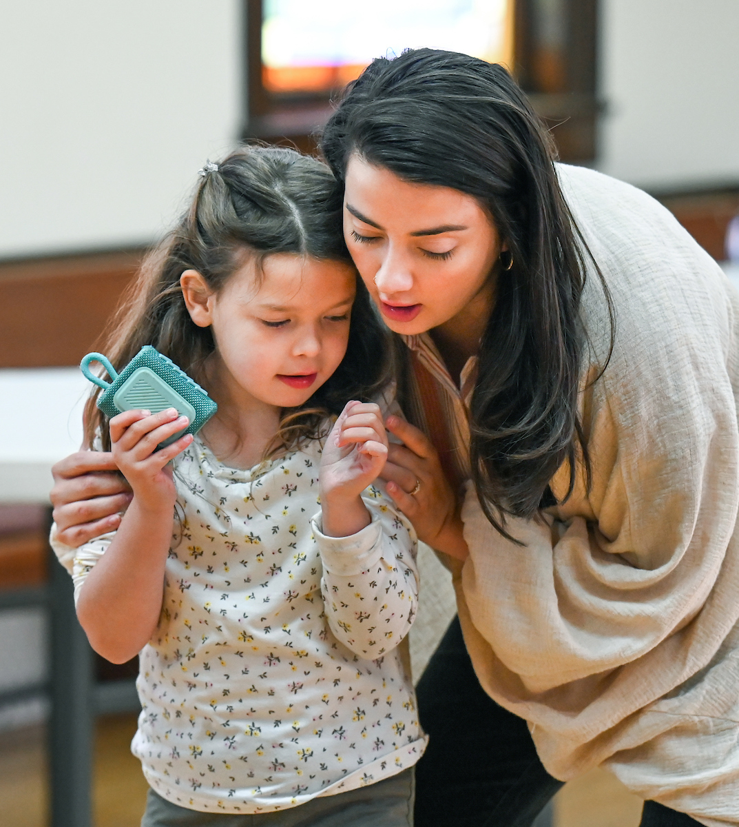 Mckenna Menard works with children in the Downside Up class at White Oak Methodist Church in Red Bank. Photo by Angela Foster.